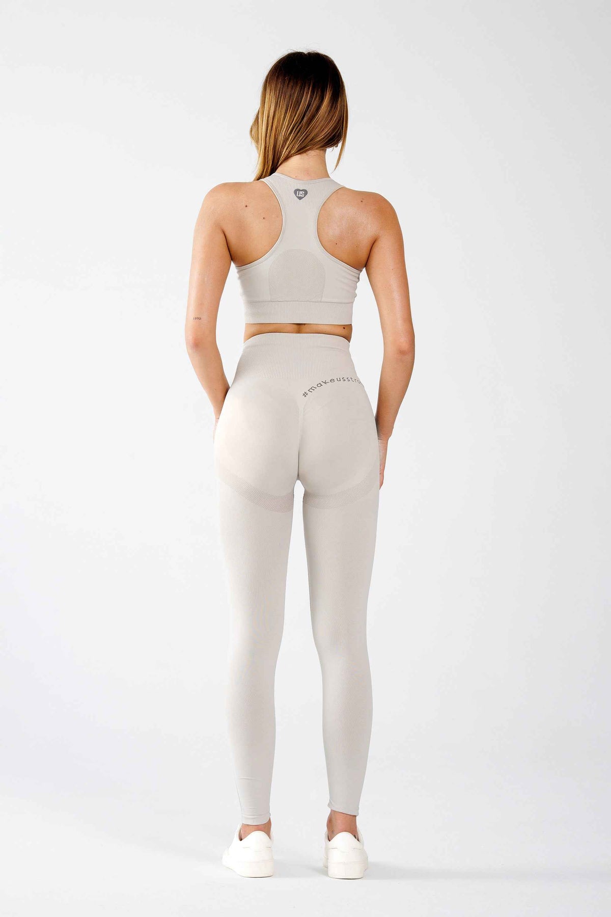 Zestaw bezszwowy sportowy top + legginsy PUSH UP cream - Florence